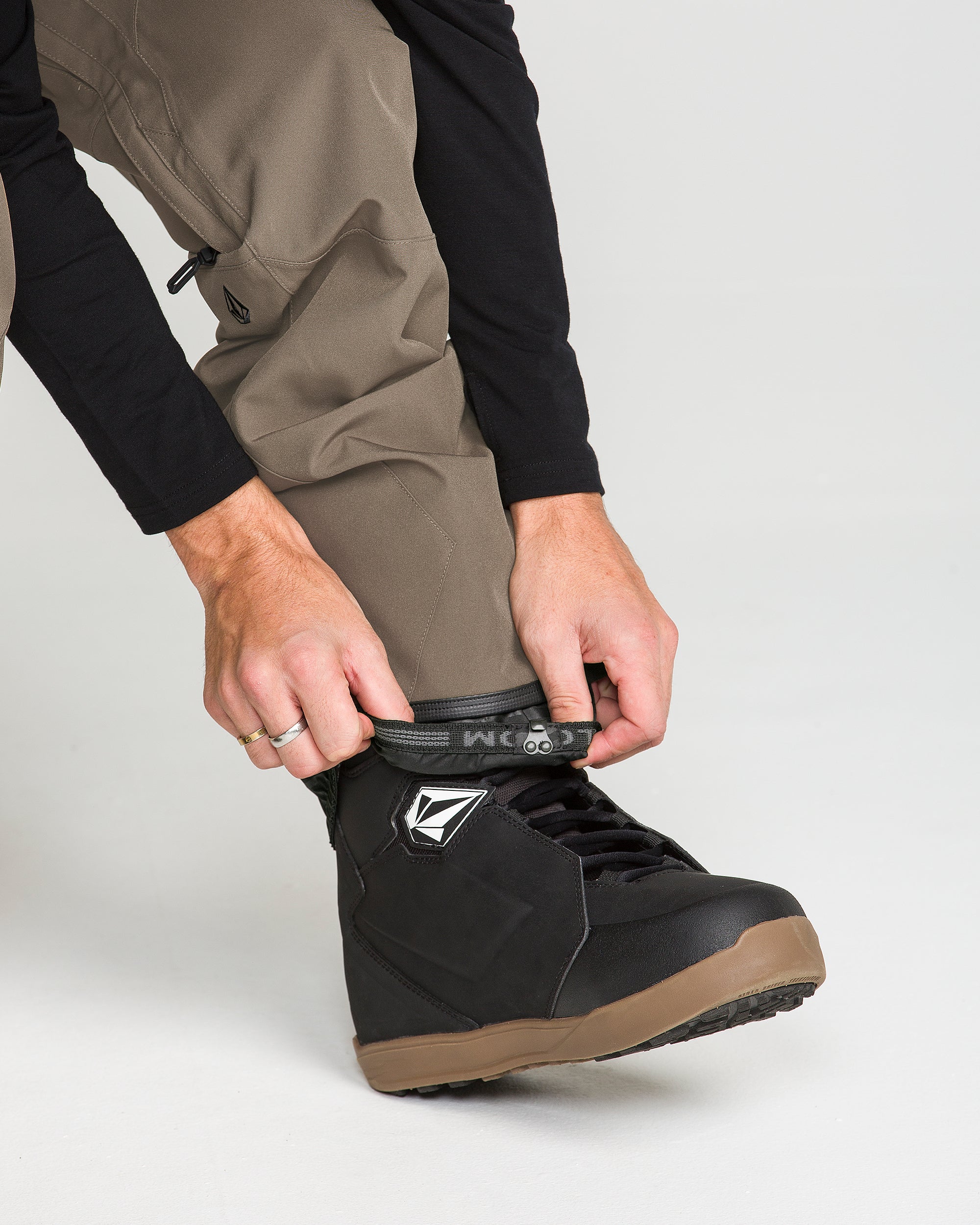 Teak bib overall lower leg with cargo pocket details and boot-ready cuff