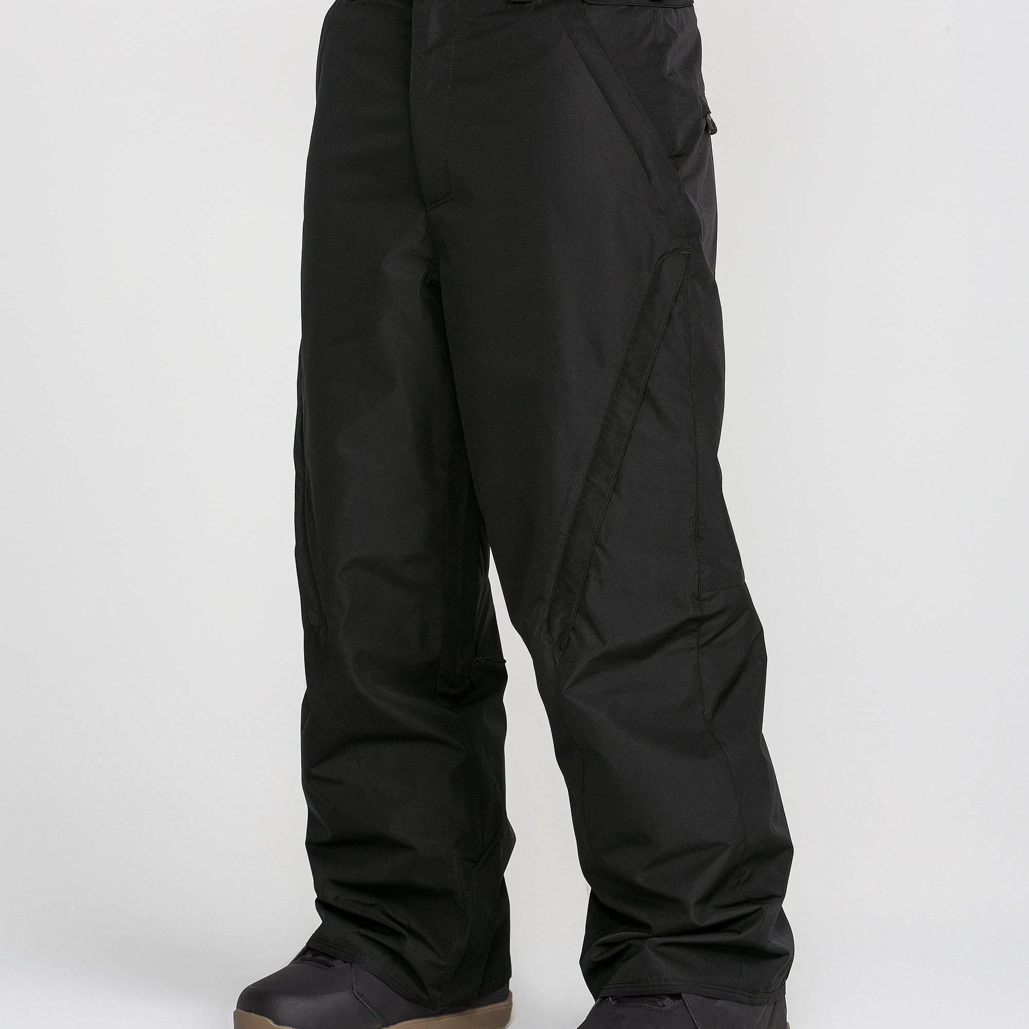 Black snow pants with cargo-style pockets and ankle cuff paneling