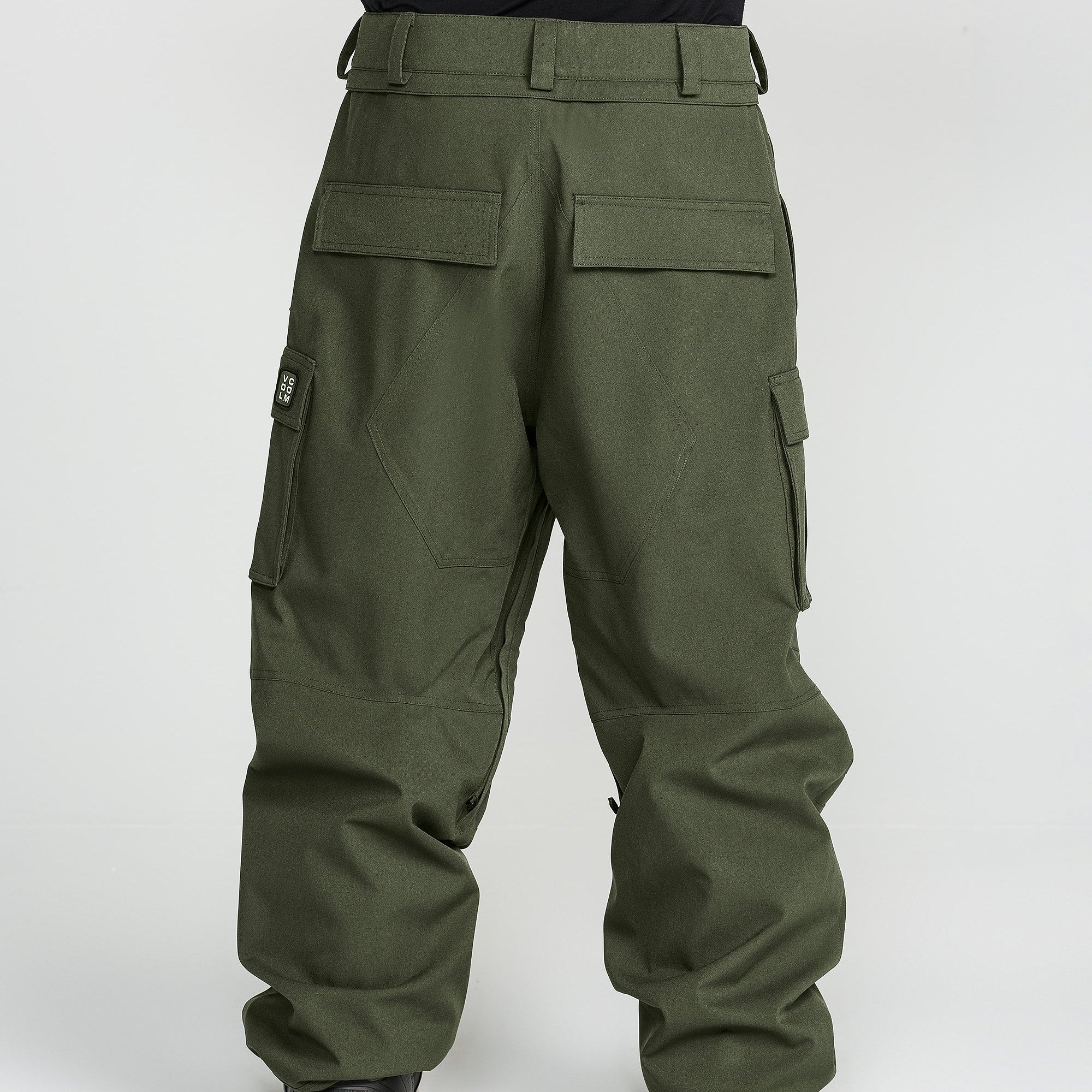 Dark green baggy cargo pants with two front flap pockets and wide waistband