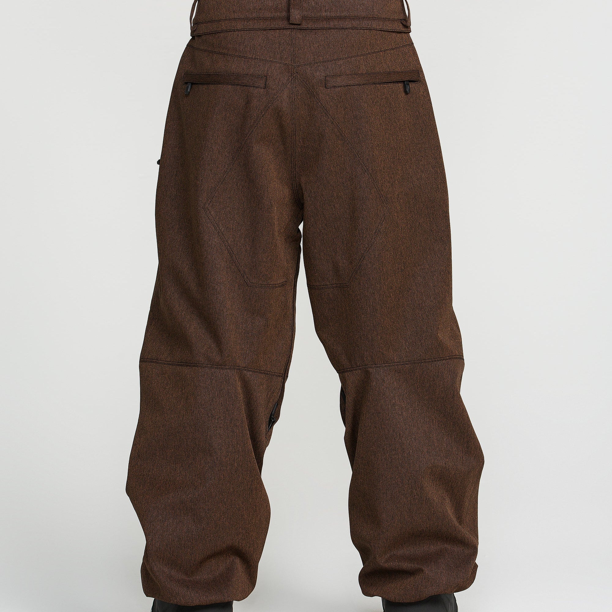 Brown snow pants back view with reinforced seams and cuffed hems