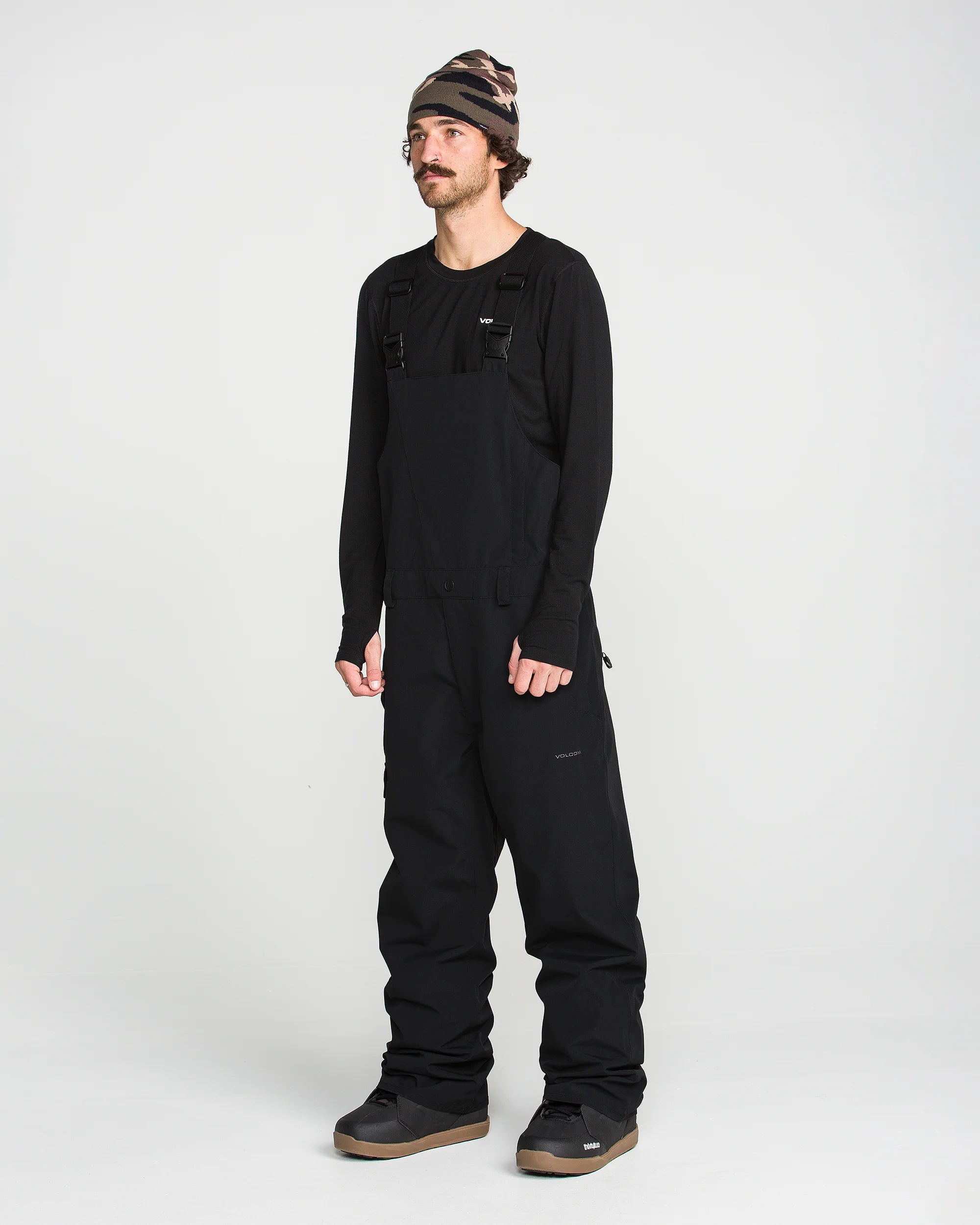 Black bib overalls with long sleeves and front pocket