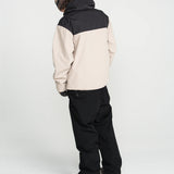 Black bib overall worn with side cargo pockets and adjustable strap buckles