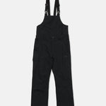Black bib overall with chest bib, utility pockets, and adjustable side straps
