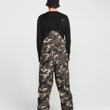 Back view of camouflage bib overalls with black rear yoke and full-length legs