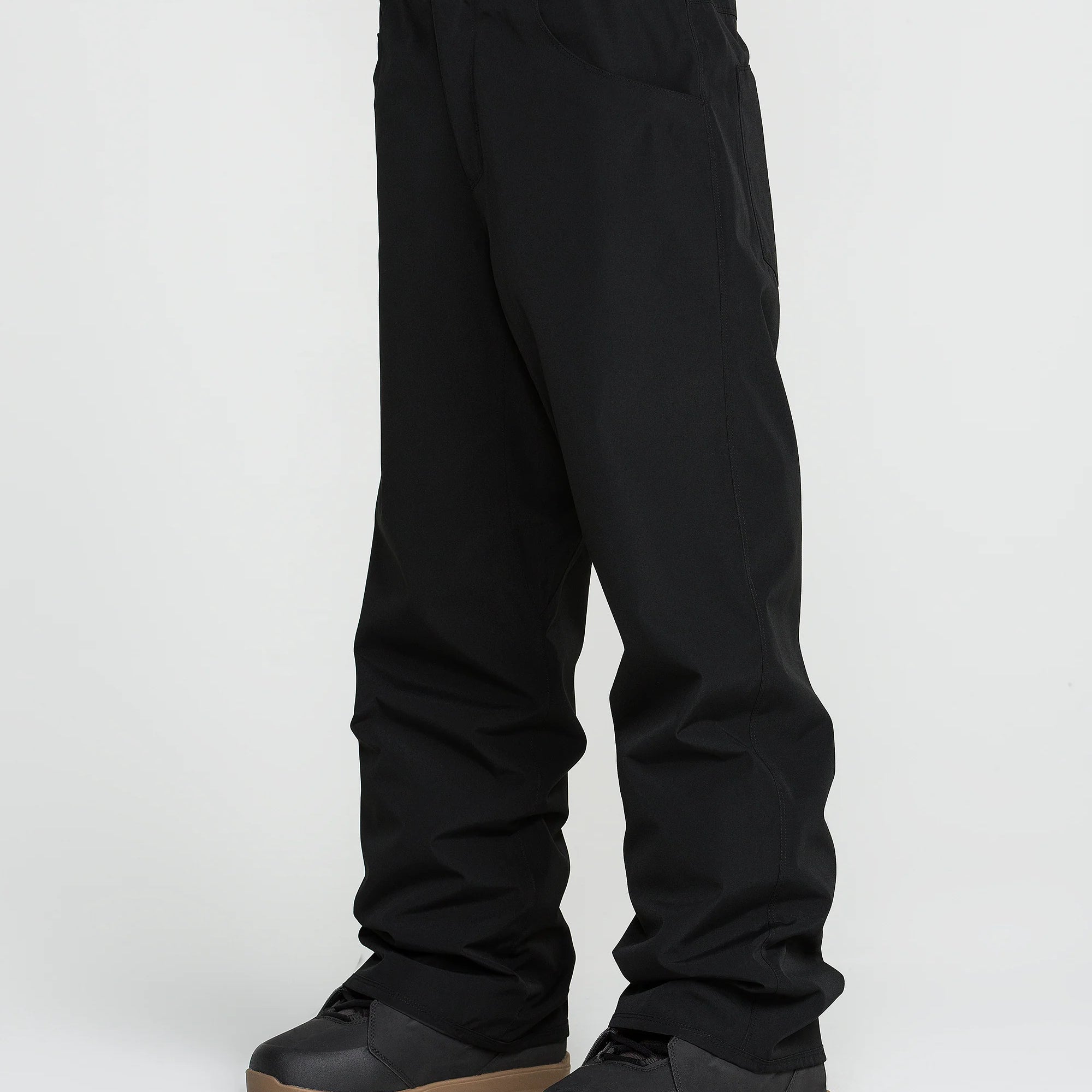 Black snow pants with cuff straps and belt loops