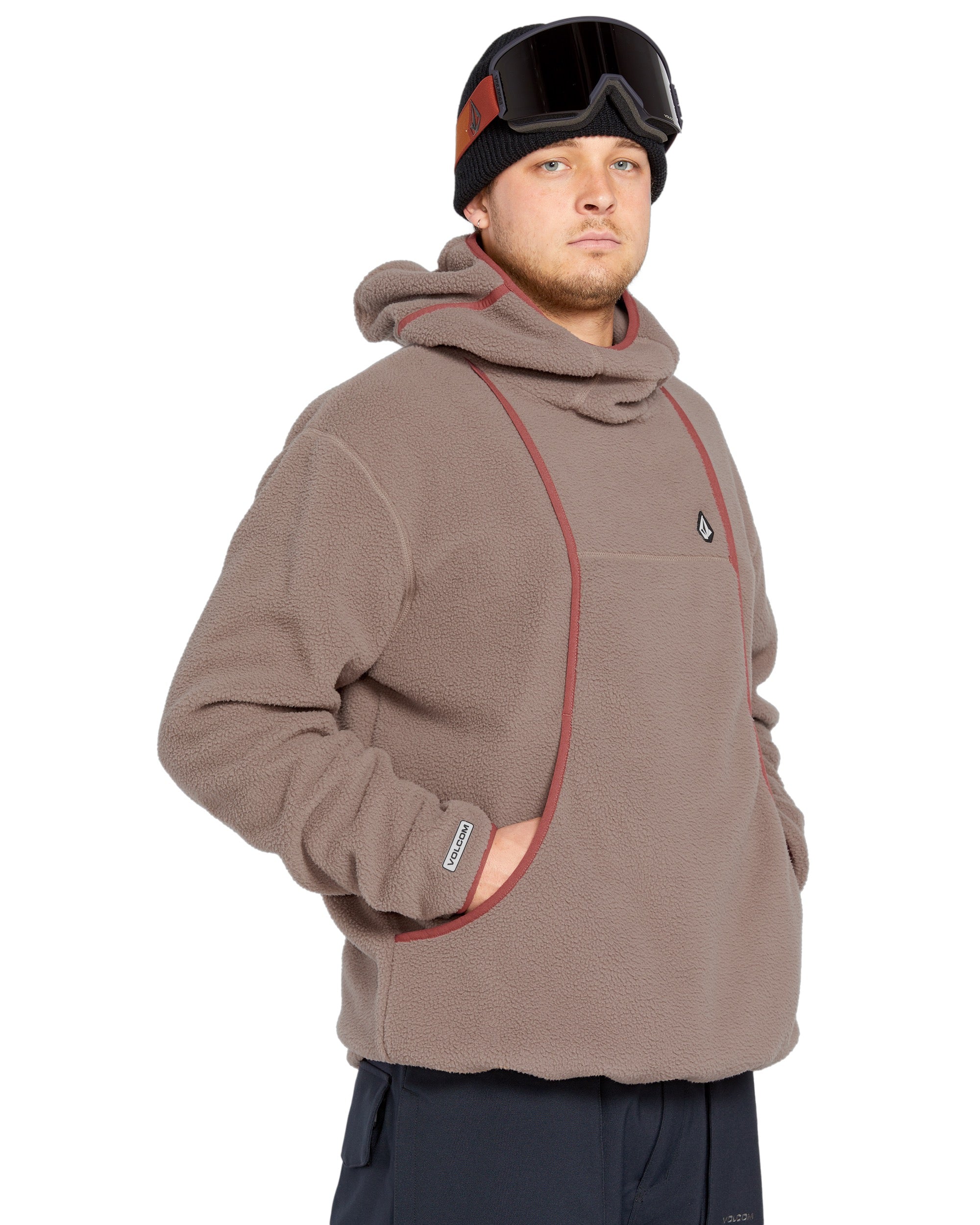 Volcom Men's Untethered Balaclava Hoodie - A tan fleece hoodie with a hood and balaclava-style face covering, featuring a small black logo on the chest.