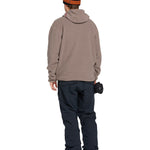 Volcom Men's Untethered Balaclava Hoodie - A tan hoodie with a hood and balaclava covering the neck area, worn by a model on a solid background.