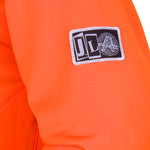 Volcom Men's Hydro Riding Hoodie 2025 - A bright orange hoodie with a white logo on the chest and a small tag near the bottom hem.