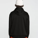 Black pullover hoodie with raised hood, no front graphic, back view