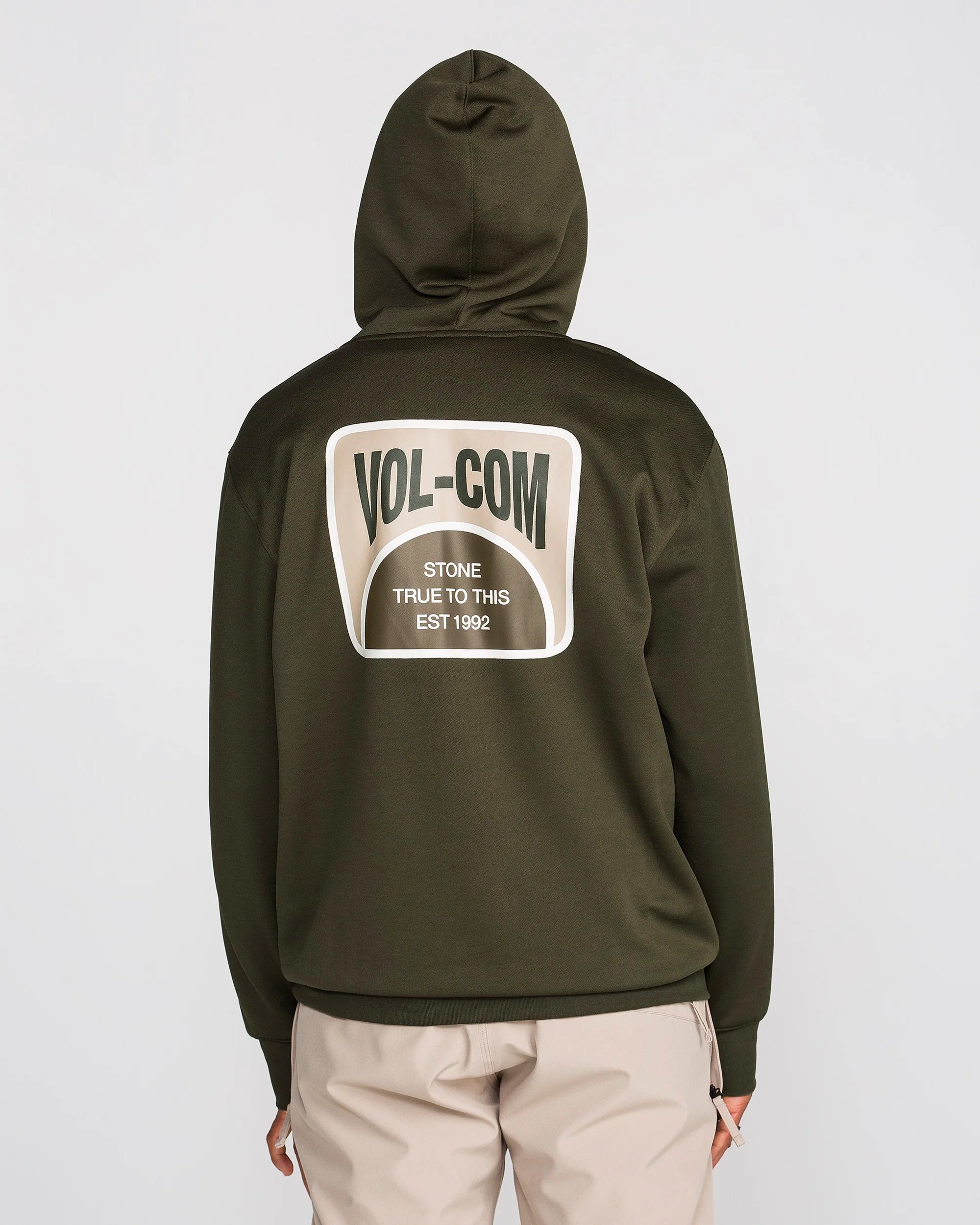 Dark green pullover hoodie with back oval VOLCOM patch and EST 1992 text