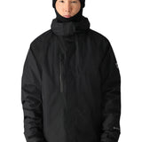 The 686 Gore-Tex Core Shell Jacket has a black exterior with a prominent white logo on the left sleeve.
