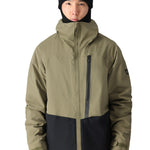 The 686 Gore-Tex shell jacket in this front view image has a khaki upper body and black lower section, with no visible logos.