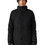 The 686 Women's GORE-TEX Willow Insulated Jacket in black has a high collar and zippered chest pocket on a front view.