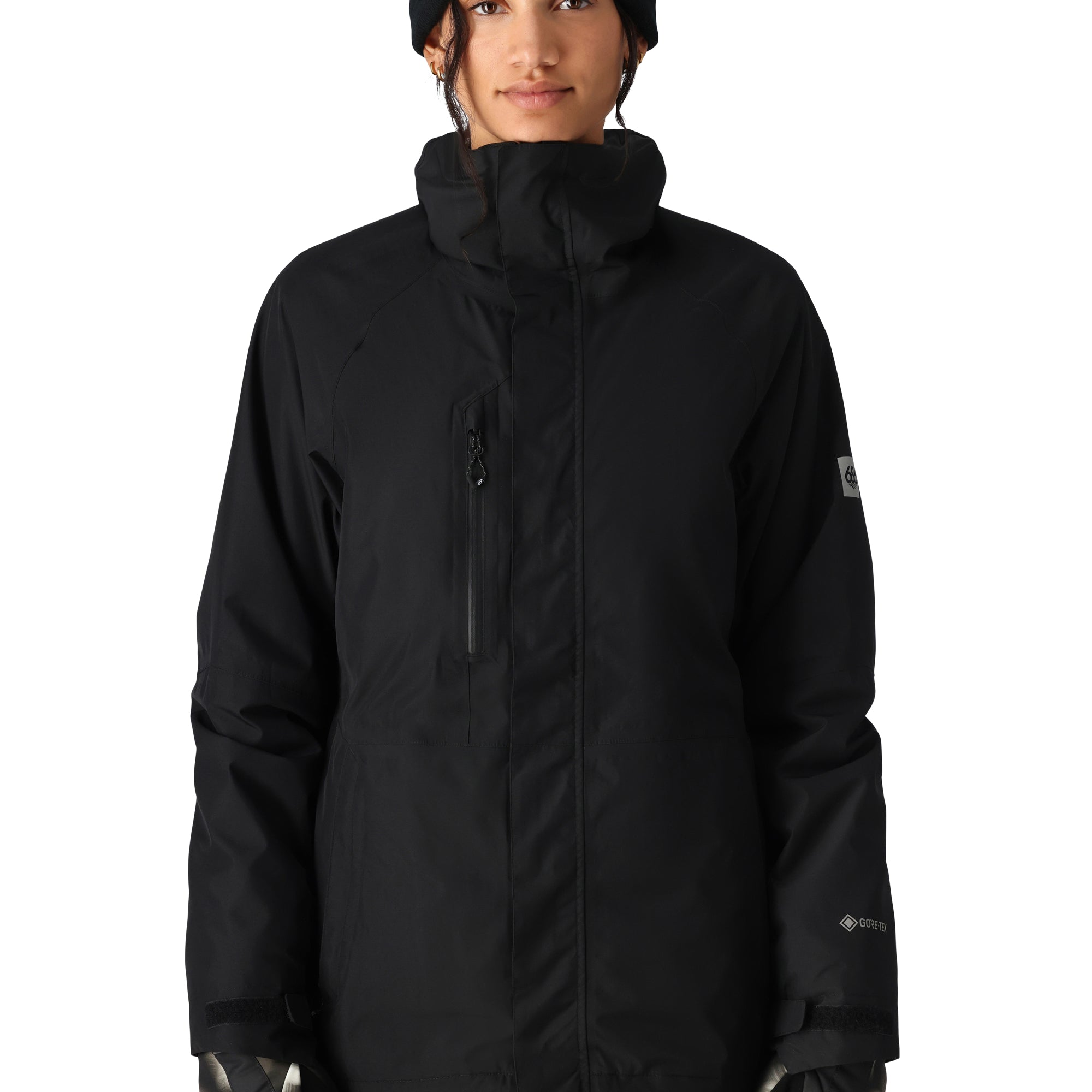 The 686 Women's GORE-TEX Willow Insulated Jacket in black has a high collar and zippered chest pocket on a front view.