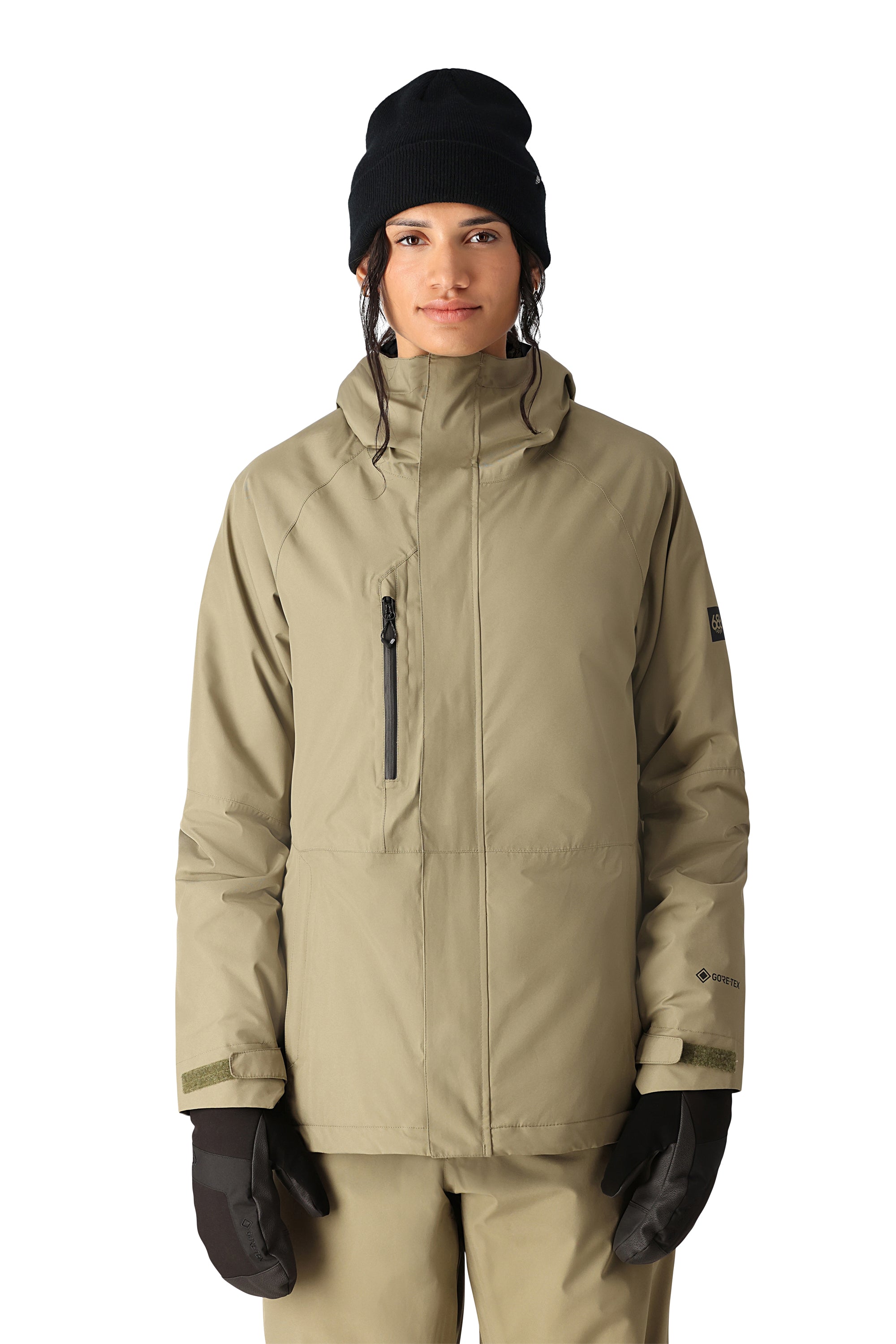 The 686 brand Willow Insulated Jacket from 2025 is a khaki-colored jacket with an insulated hood.