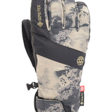 The 686 Men's GORE-TEX Linear Under Cuff Glove 2025 is shown in a front view with a gray and tan camouflage pattern.