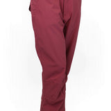 Women’s maroon shell pant with zip pockets and belt loops