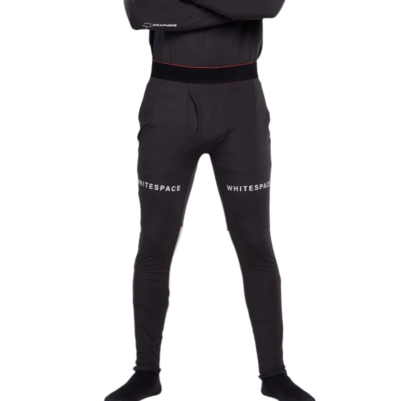 Whitespace Graphene Midweight Base Layer Bottom 2024 - A man wearing black base layer bottoms with a red stripe at the waistband and white lettering that reads "Graphene" on the left leg.
