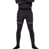Whitespace Graphene Midweight Base Layer Bottom 2024 - A man wearing black base layer bottoms with a red stripe at the waistband and white lettering that reads "Graphene" on the left leg.