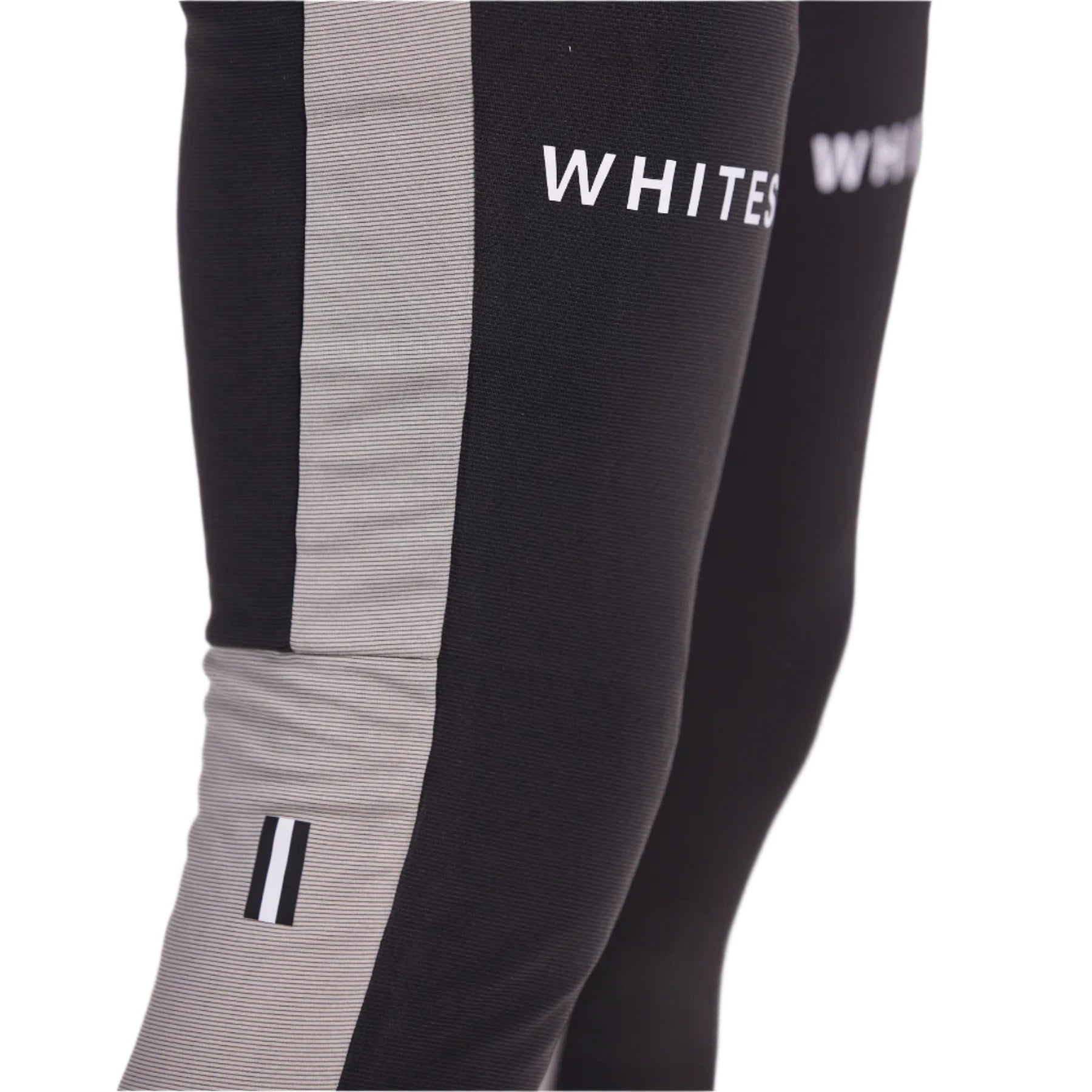 Whitespace Graphene Midweight Base Layer Bottom 2024 - A pair of black base layer bottoms with a white stripe down the side and a small logo on the left leg.