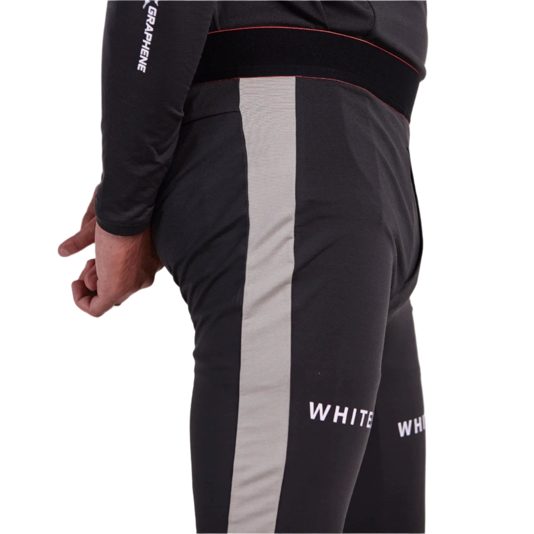 Whitespace Graphene Midweight Base Layer Bottom 2024 - A black base layer bottom with a white stripe down the side and "WHITE SPACE" logo on the left leg.