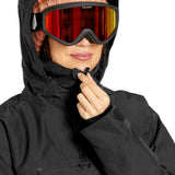 Volcom Women's Fern Insulated GORE-TEX Pullover - A black insulated pullover with a hood, featuring a zippered chest pocket and adjustable cuffs.