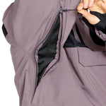 Volcom Women's Fern Insulated GORE-TEX Pullover - A dusty rose-colored pullover with a black zipper and two zippered pockets on the front.