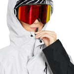 Volcom Women's V.Co Aris Insulated GORE-TEX Jacket - A black and white striped beanie is worn under a hood with a shiny silver lining.