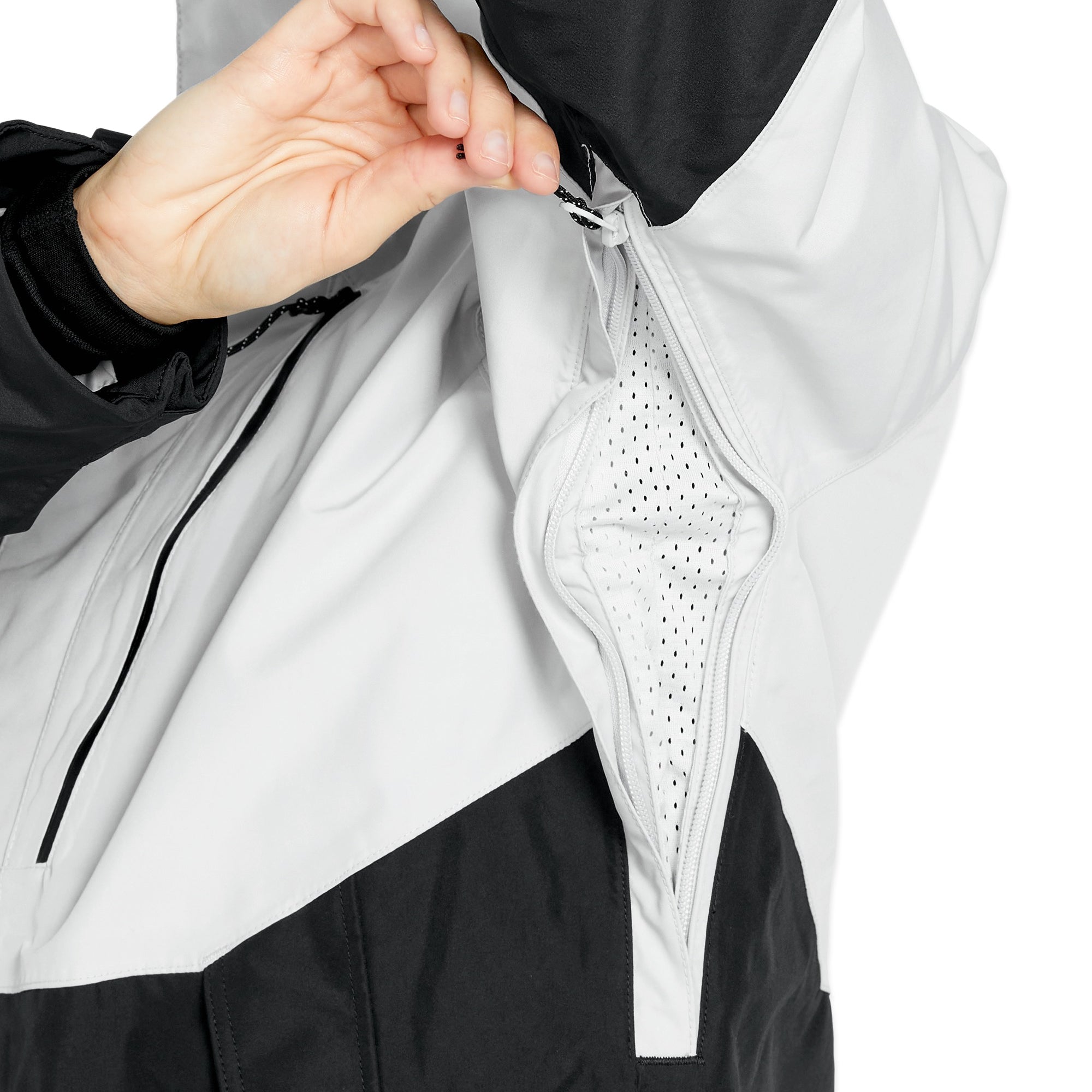 Volcom Women's V.Co Aris Insulated GORE-TEX Jacket - A black and white jacket with a zippered front, featuring a hood and two pockets on either side.