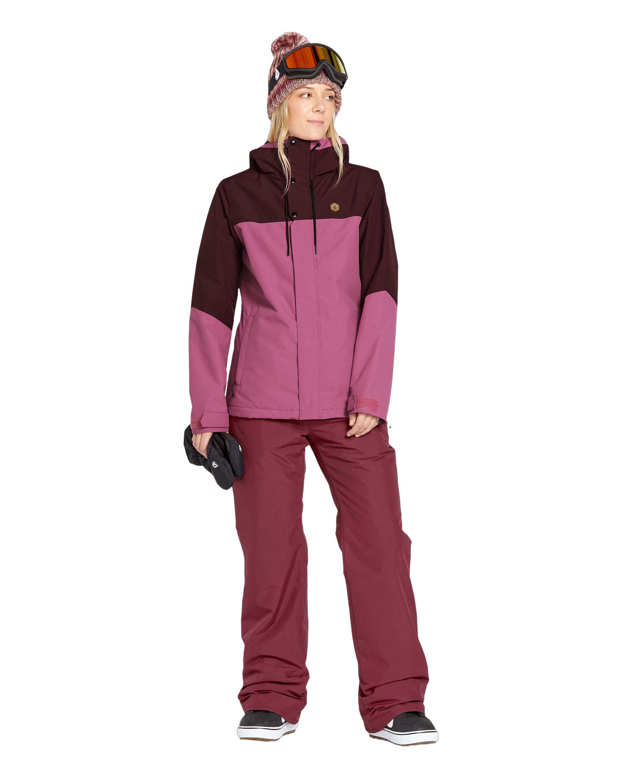 Volcom Women's Bolt Ins Jacket 2025 - A pink and black jacket with a hood, featuring a zipper closure and two zippered pockets on the front.