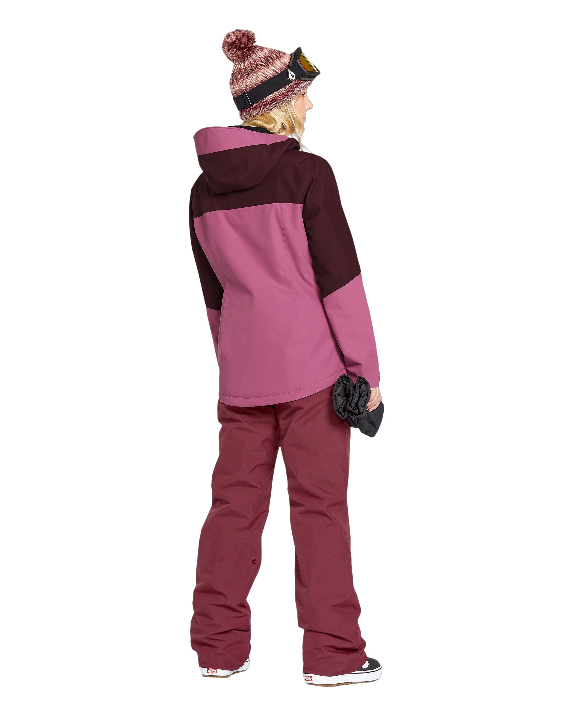 Volcom Women's Bolt Ins Jacket 2025 - A pink jacket with a hood, featuring a black stripe across the chest and two zippered pockets on either side.