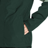 Volcom Women's Bolt Ins Jacket 2025 - A dark green jacket with a zippered chest pocket and adjustable cuffs.