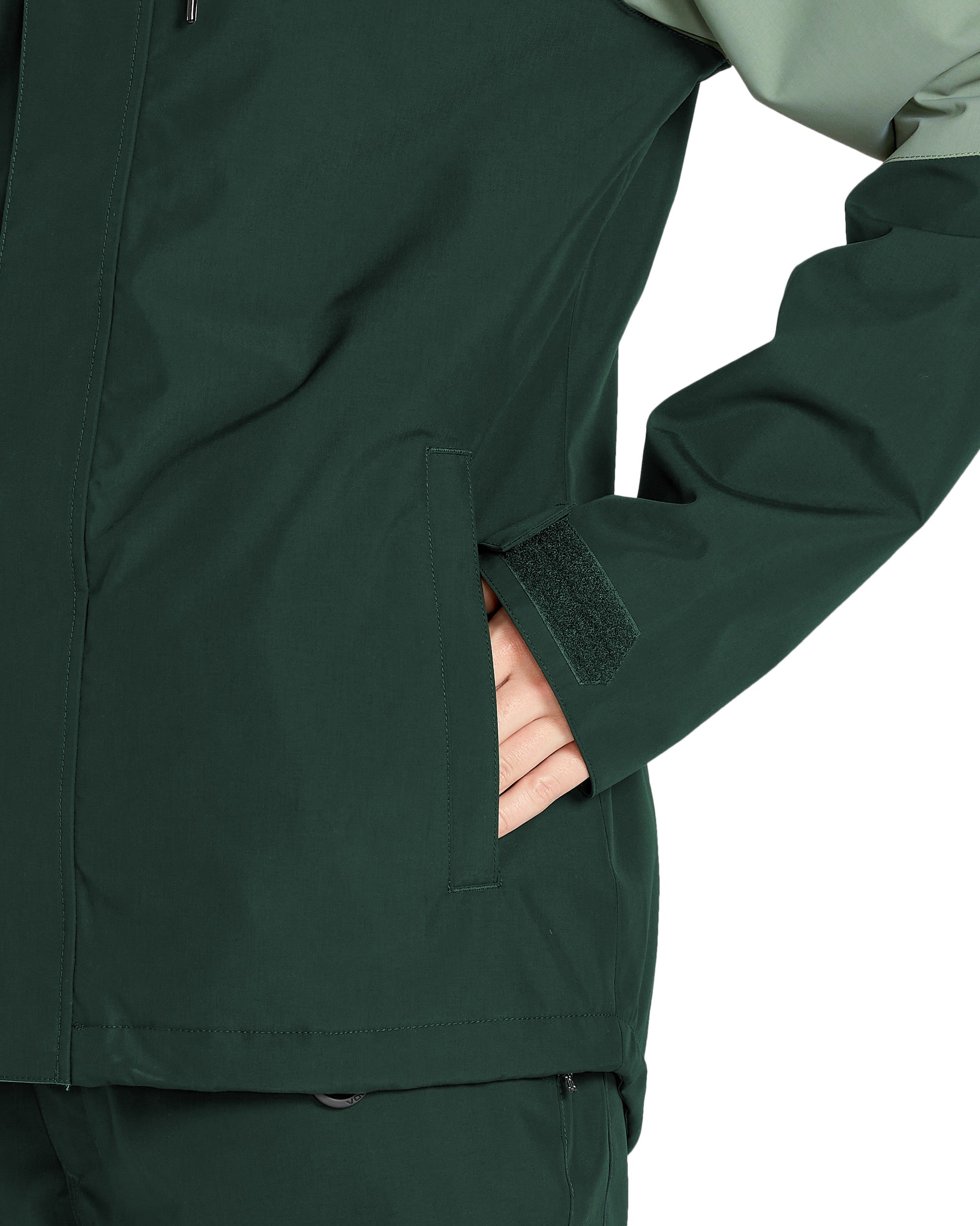 Volcom Women's Bolt Ins Jacket 2025 - A dark green jacket with a zippered chest pocket and adjustable cuffs.