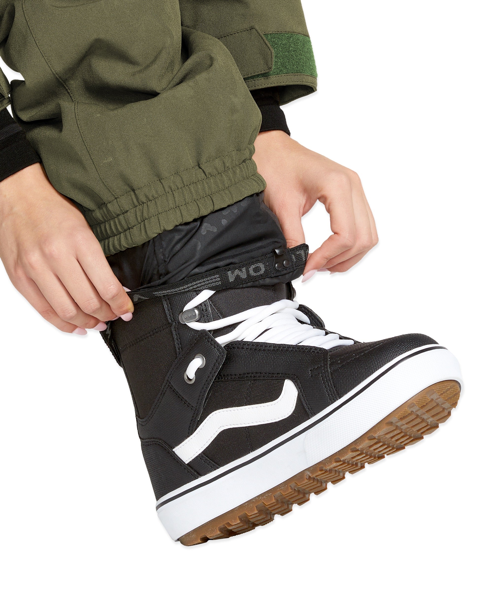 Volcom Women's Shiloh Snow Suit 2025 - A black snowsuit with a white logo on the left chest and a zipper running down the front.