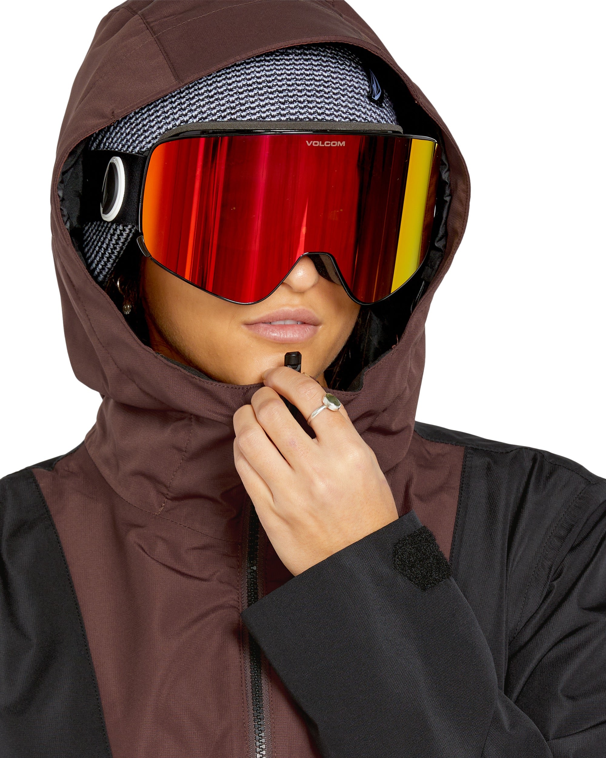 Volcom Women's Ashfield Pullover - A brown, hooded pullover with a zipper down the front and two zippered pockets on the side.