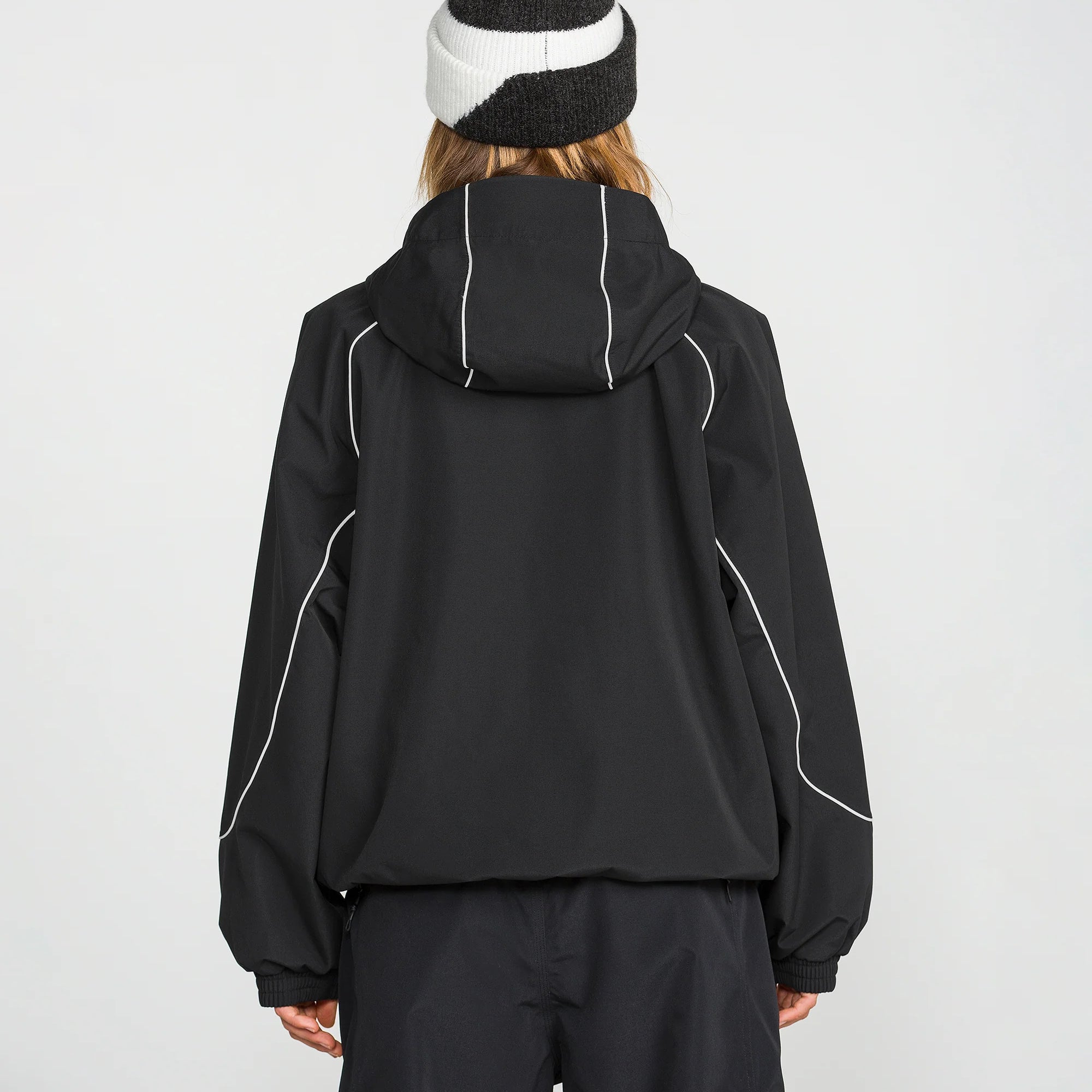 Women's black hooded ski jacket, back view with white trim and full-length front zipper.