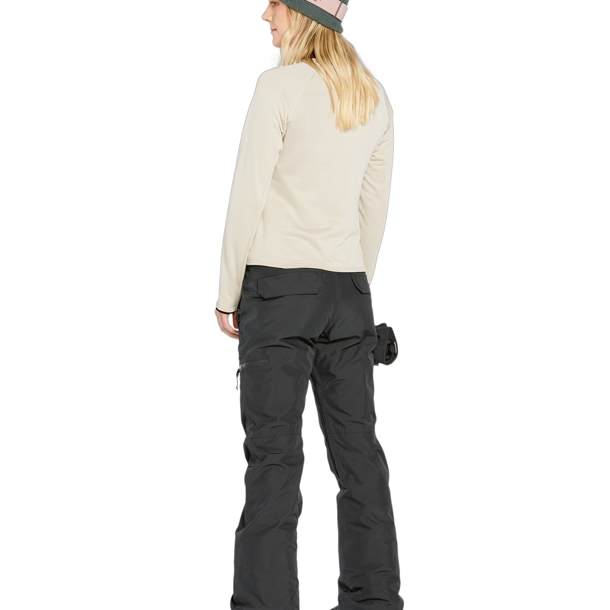 Volcom Women's Knox Insulated GORE-TEX Pant - A pair of black insulated ski pants with a zippered pocket on the side and a small logo patch near the bottom hem.