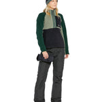 Volcom Women's Knox Insulated GORE-TEX Pant - A pair of black insulated ski pants with a zippered pocket on the thigh and a white logo on the left leg.