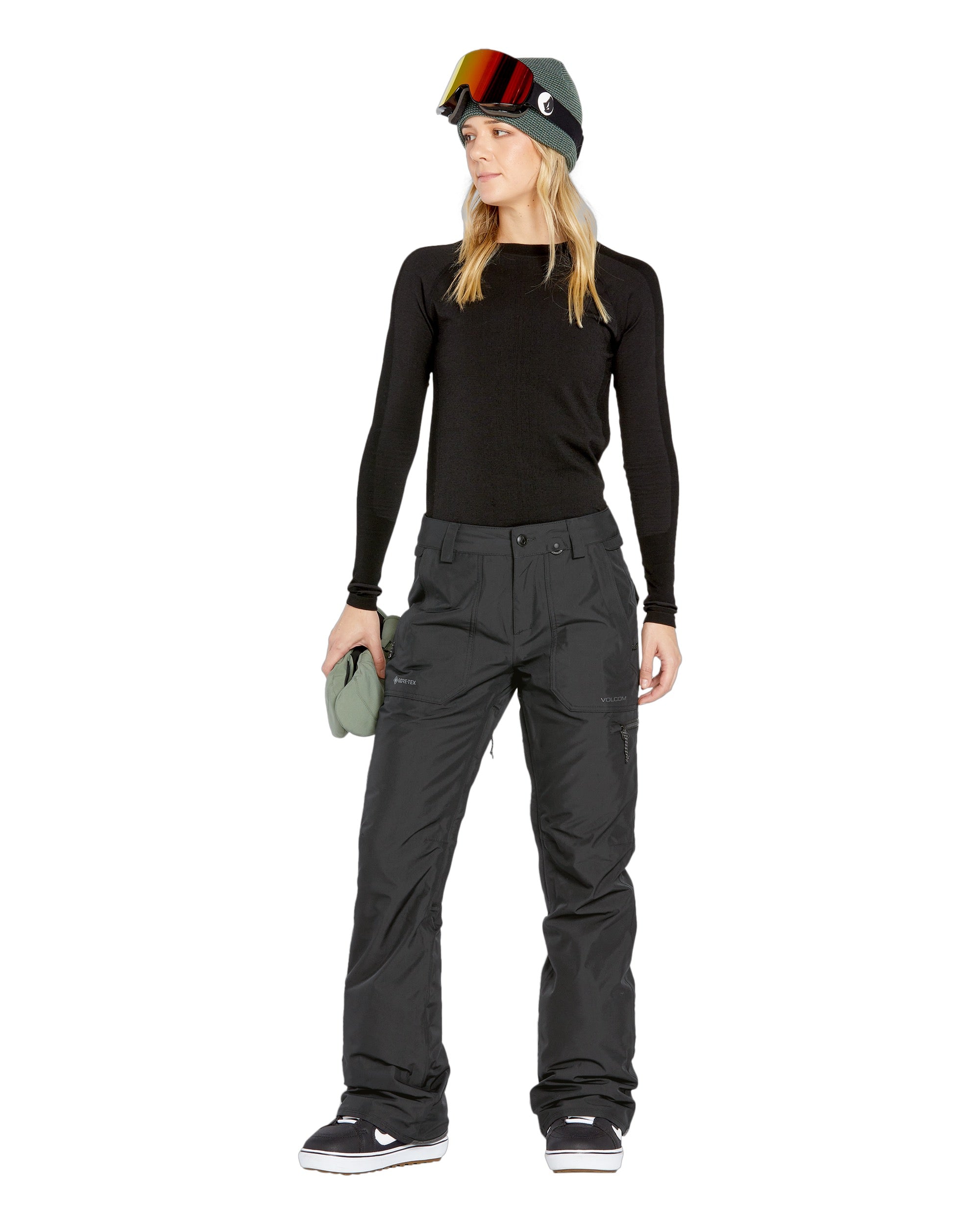 Volcom Women's Knox Insulated GORE-TEX Pant - A pair of black insulated ski pants with a zippered pocket on the thigh and a white logo on the left leg.