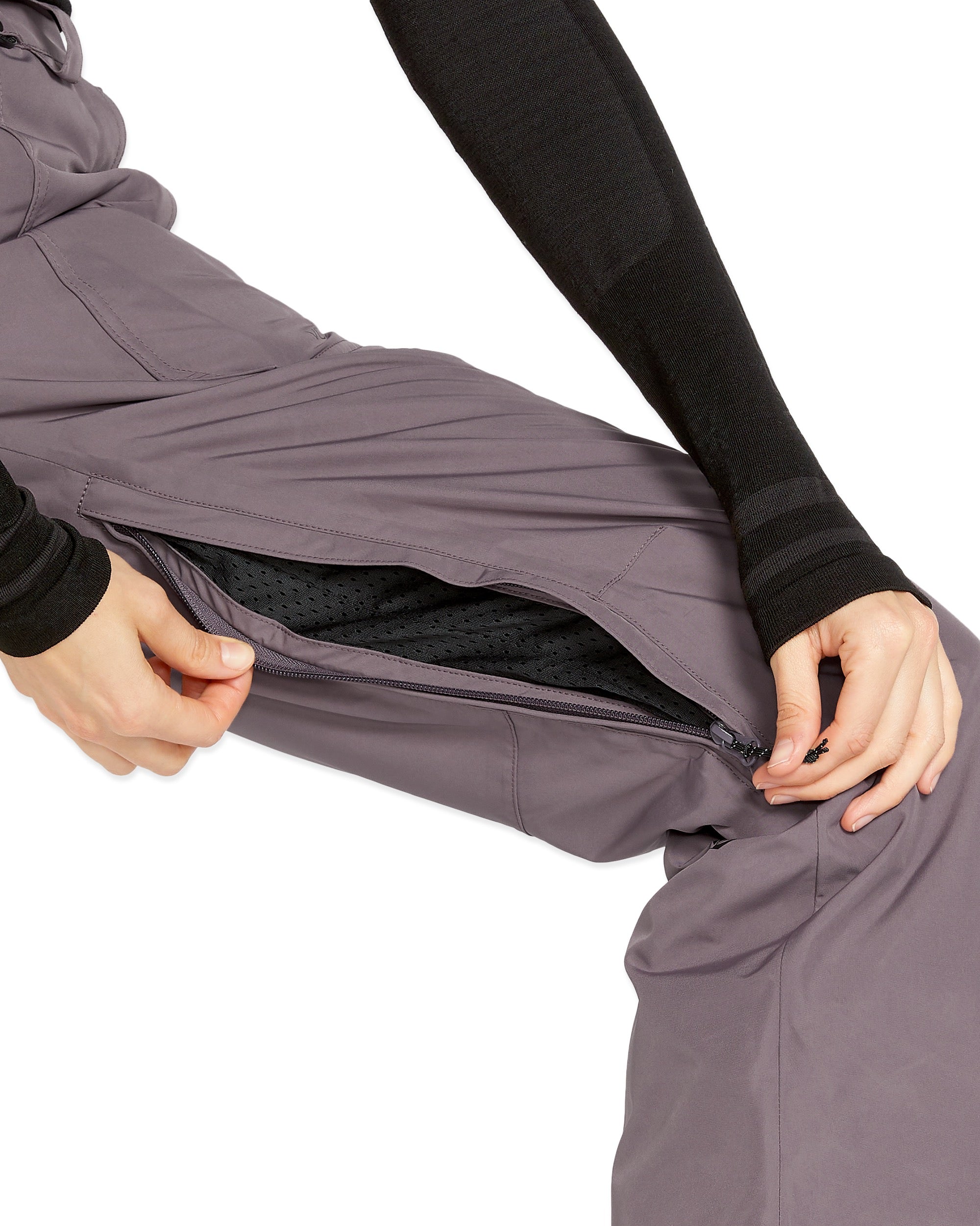 Volcom Women's Knox Insulated GORE-TEX Pant - A pair of gray snow pants with a zippered pocket on the thigh and a black zipper pull.