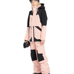 Volcom Women's Creston 3D Stretch Bib Overall - A pink and black bib overall with a geometric pattern on the front, featuring a zippered fly and adjustable straps.