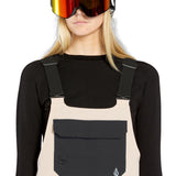 Volcom Women's Creston 3D Stretch Bib Overall - Beige bib overalls with black straps and a front pocket.