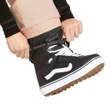 Volcom Women's Creston 3D Stretch Bib Overall - Black bib overalls with a subtle pattern of small, light-colored flowers on the lower portion.