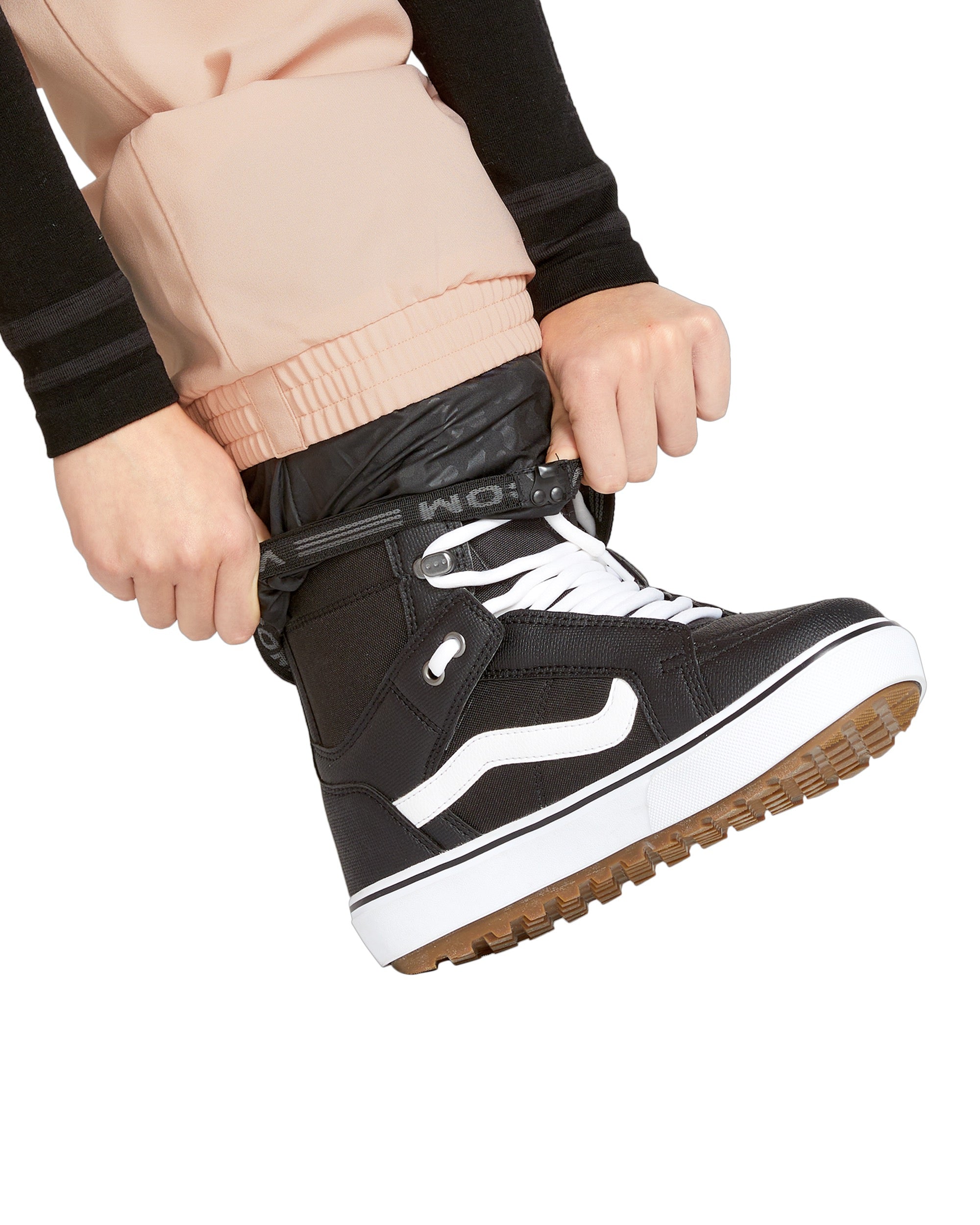 Volcom Women's Creston 3D Stretch Bib Overall - Black bib overalls with a subtle pattern of small, light-colored flowers on the lower portion.