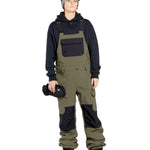 Volcom Women's Creston 3D Stretch Bib Overall - Olive green bib overalls with black accents and a zippered fly.