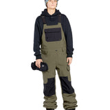 Volcom Women's Creston 3D Stretch Bib Overall - Olive green bib overalls with black accents and a zippered fly.