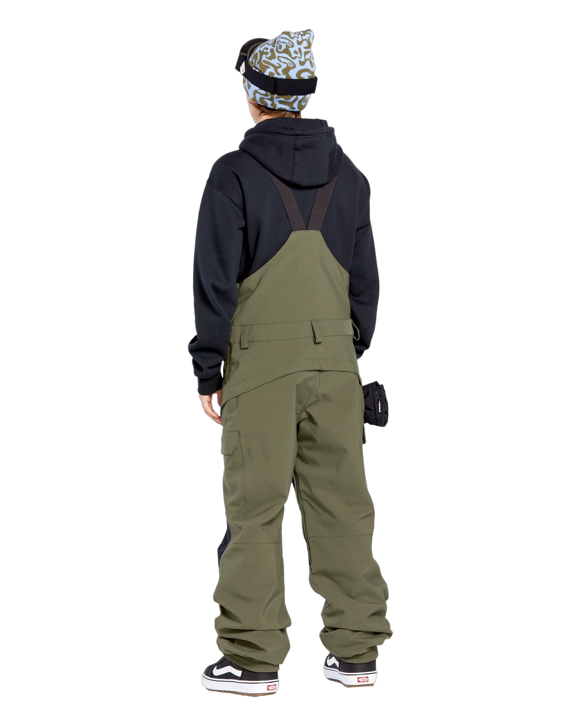 Volcom Women's Creston 3D Stretch Bib Overall - Olive green bib overalls with a black waistband and belt loops, featuring a zip fly and button closure.