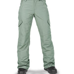 Volcom Women's Bridger Ins Pant 2025 - A pair of women's snowboard pants in a light sage green color with two zippered pockets on each side.