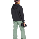 Volcom Women's Bridger Ins Pant 2025 - A pair of olive green snowboard pants with a zippered pocket on the thigh and adjustable Velcro straps at the waist.