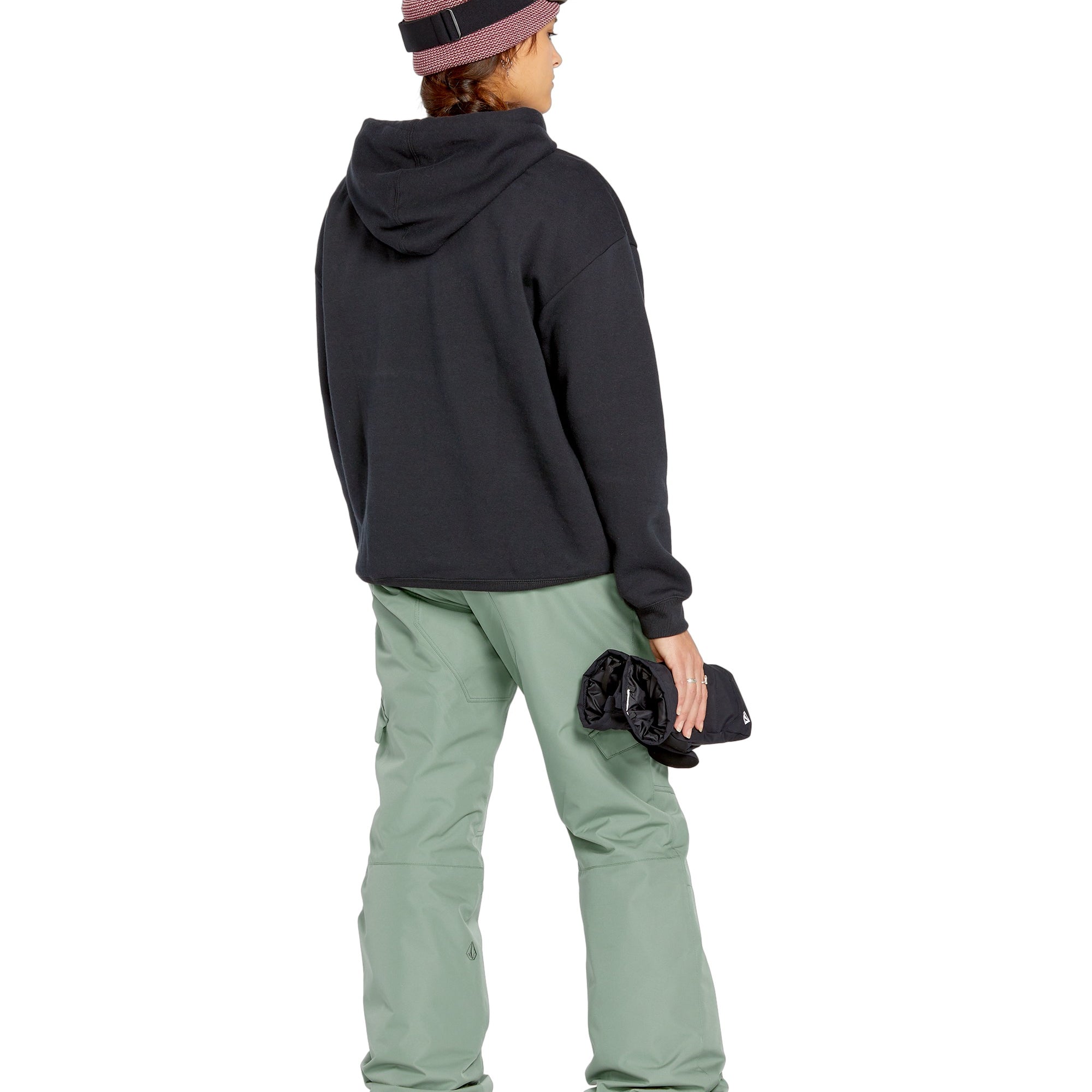 Volcom Women's Bridger Ins Pant 2025 - A pair of olive green snowboard pants with a zippered pocket on the thigh and adjustable Velcro straps at the waist.